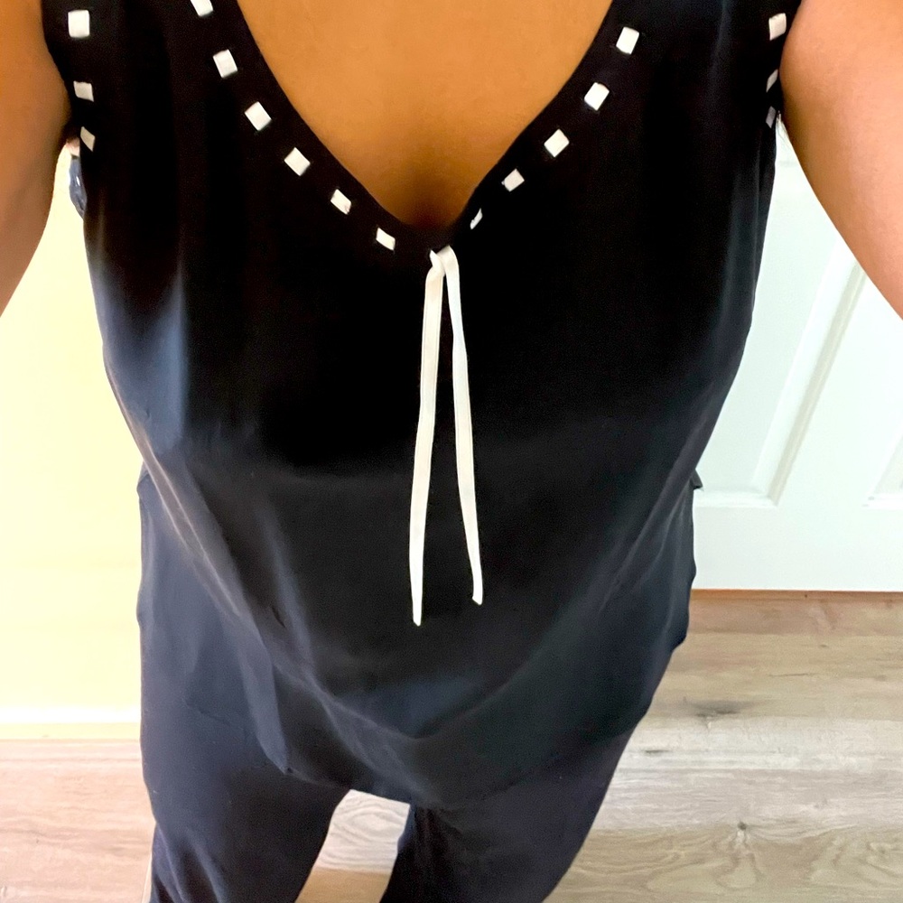 Escada cami, size 42 but can fit a variety of shapes and sizes